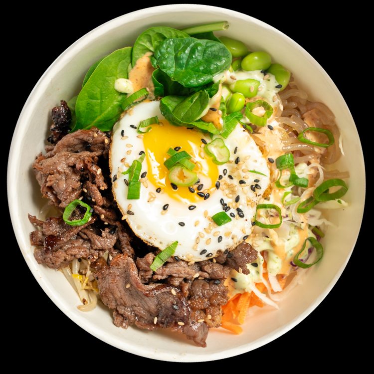 K-BOB Bulgogi Kup-Bob rice bowl with marinated beef, fried egg, and vegetables